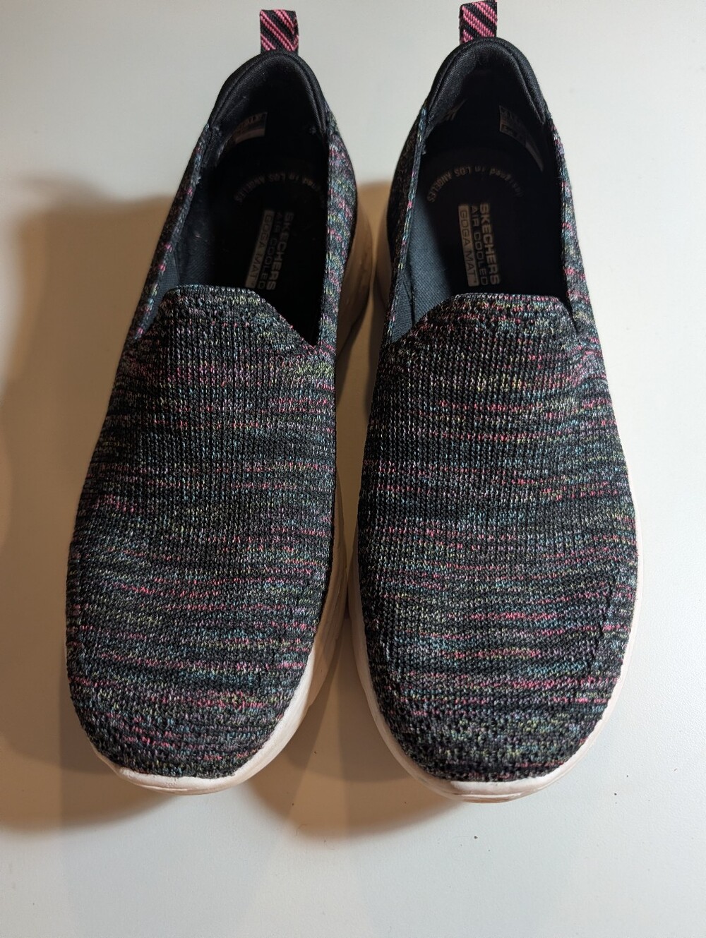 Skechers Slip-On Knit Sneakers in Black with Pink Accents